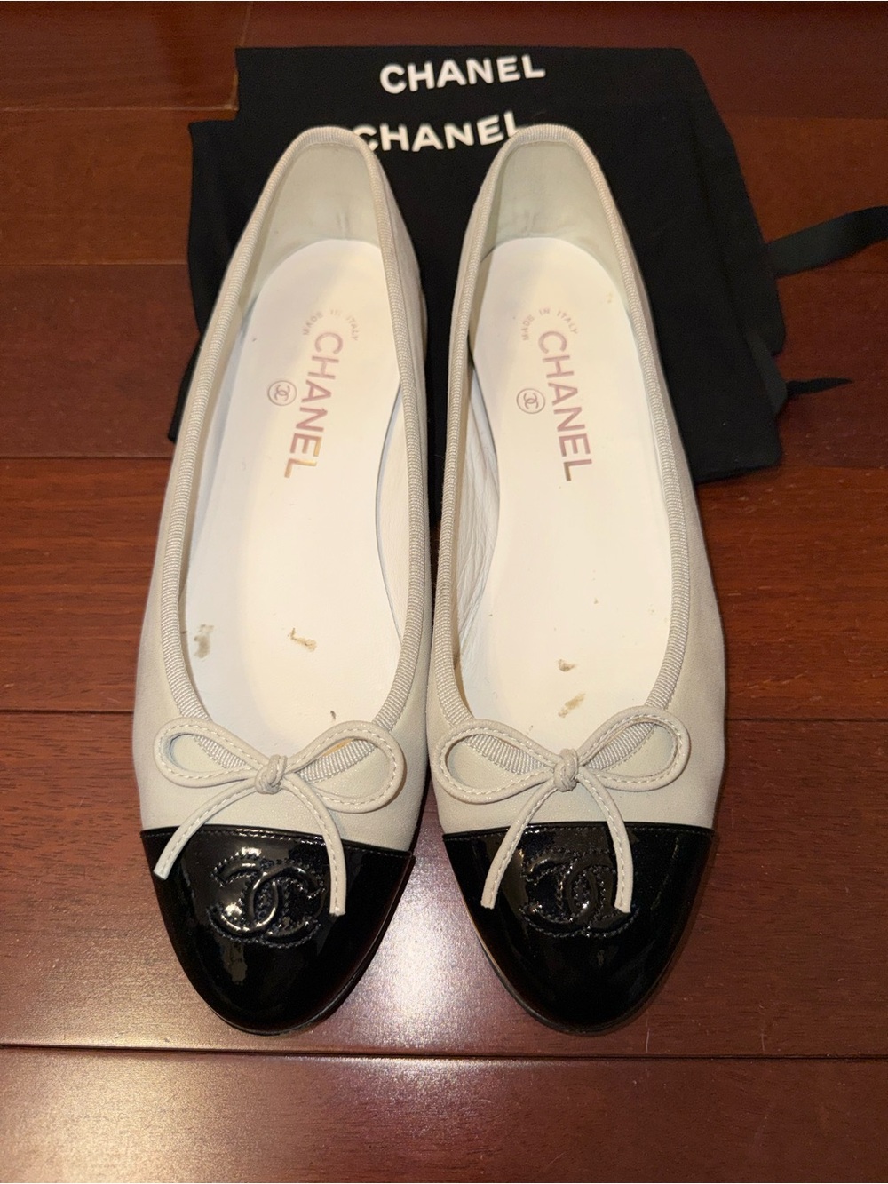 CHANEL Two-Tone Leather Ballet Flats in White and Black - Picture 1 of 9